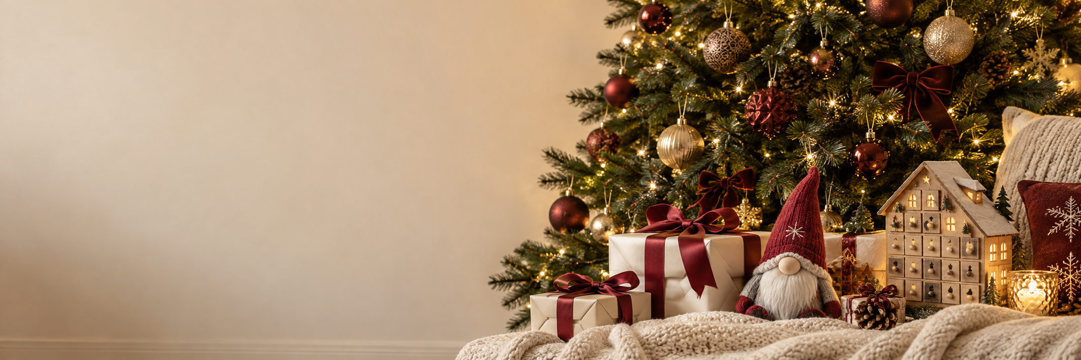 A glowing Christmas tree, ribbon-wrapped gifts and a festive wooden advent calendar
